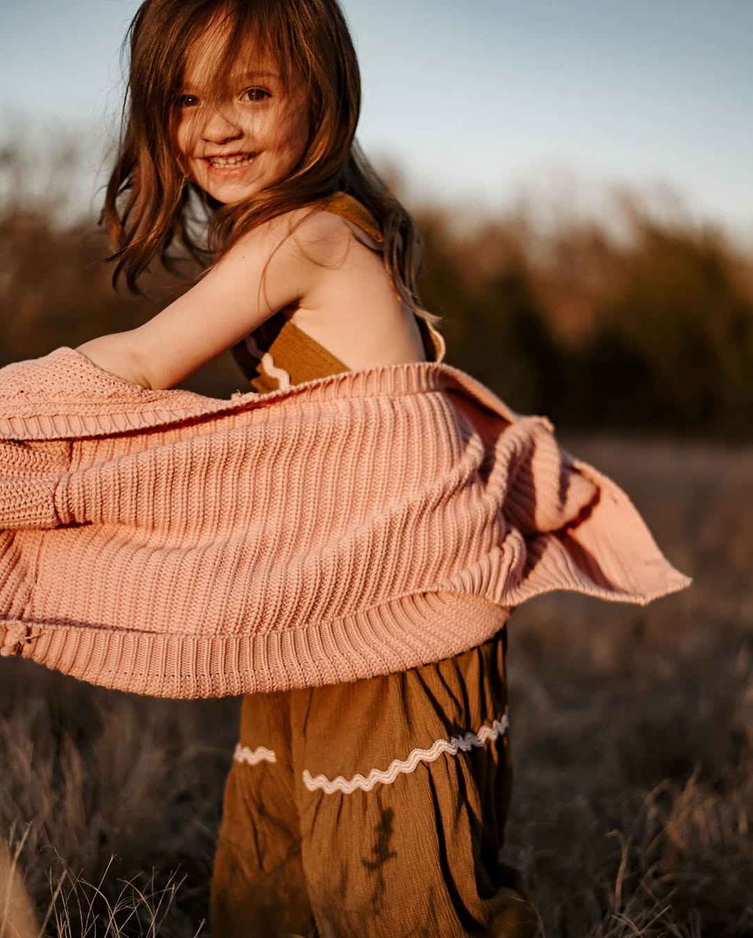 A family photographed by Amy Henry of Archer + James near McKinney, Texas at golden hour